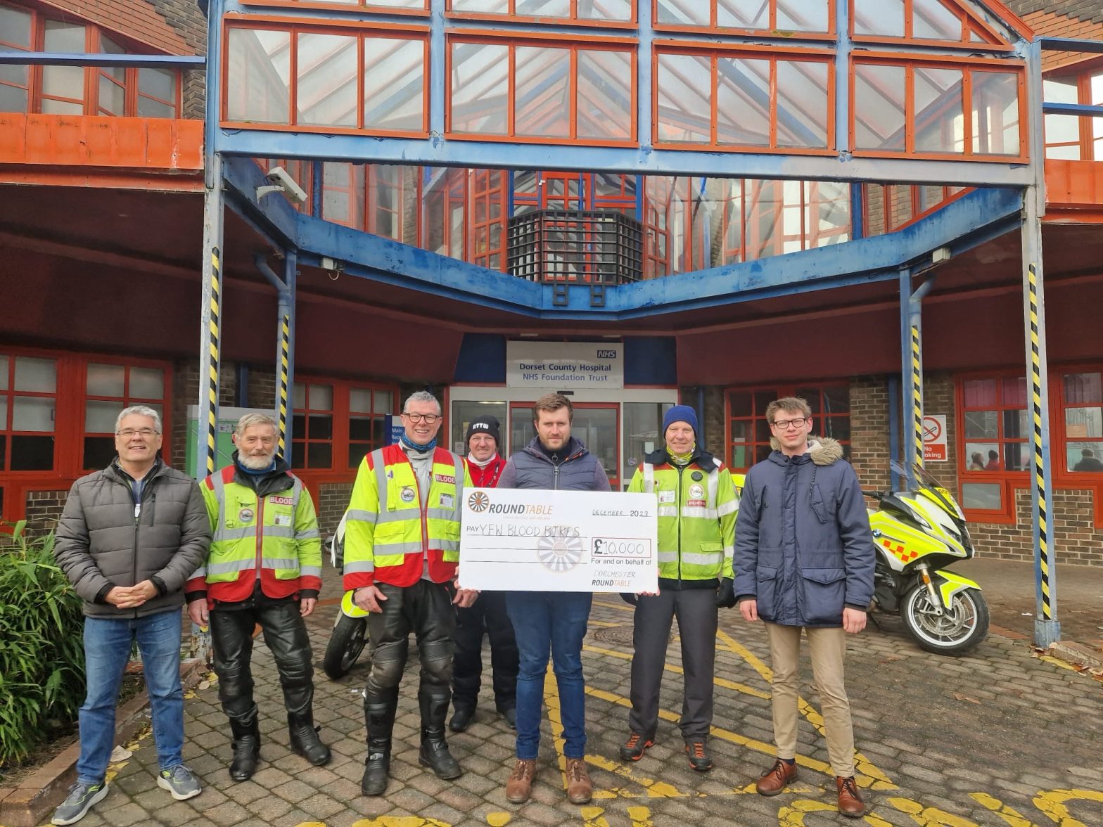 dorchester round table donate to Blood Bikes - presented outside Dorset County Hospital